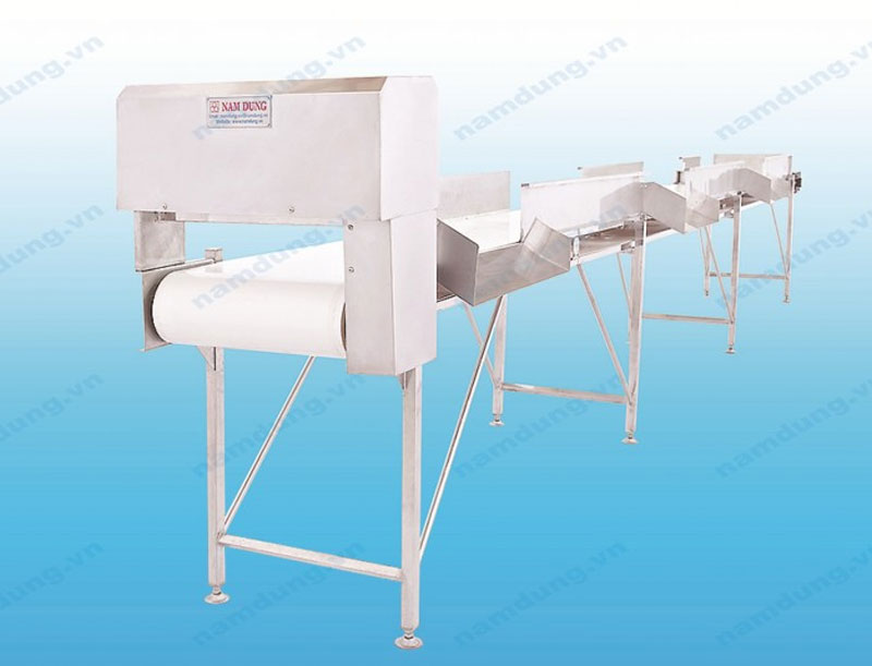 DISTRIBUTING CONVEYOR